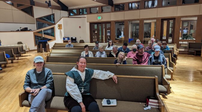 Church with people sitting in pews