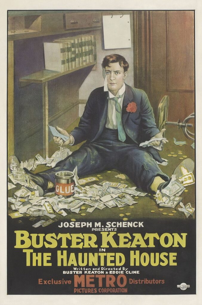 Film poster showing Buster Keaton sitting in a pile of money with a can of glue