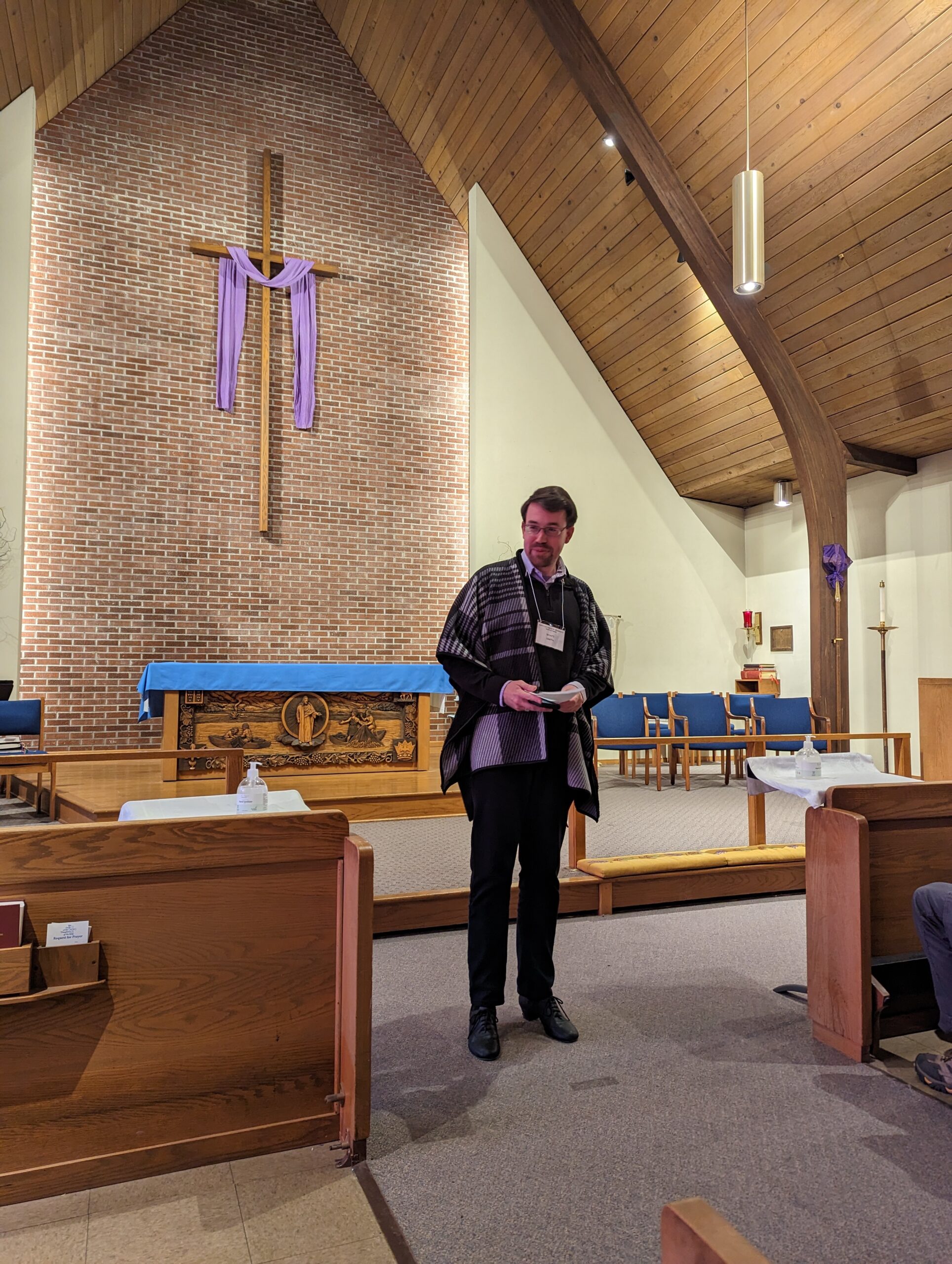 Man standing in front of room talking