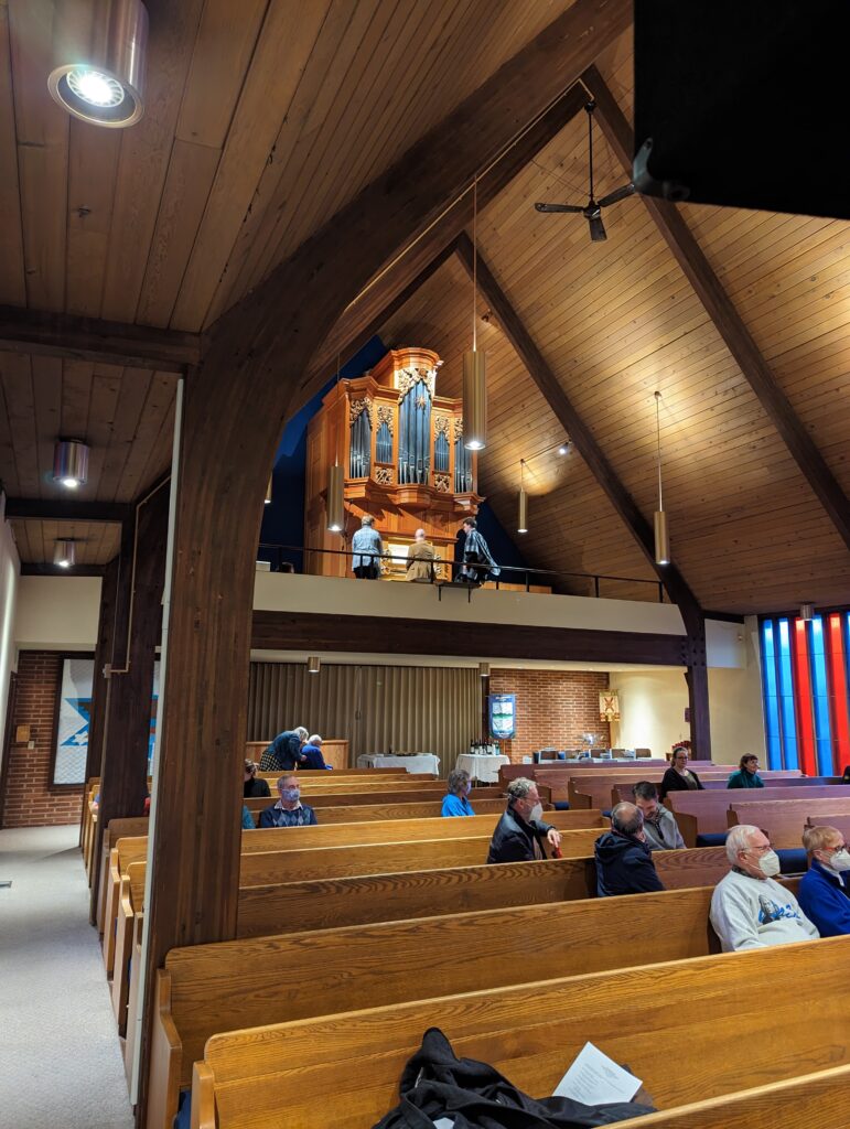 View of church showing audience and gallery with organ
