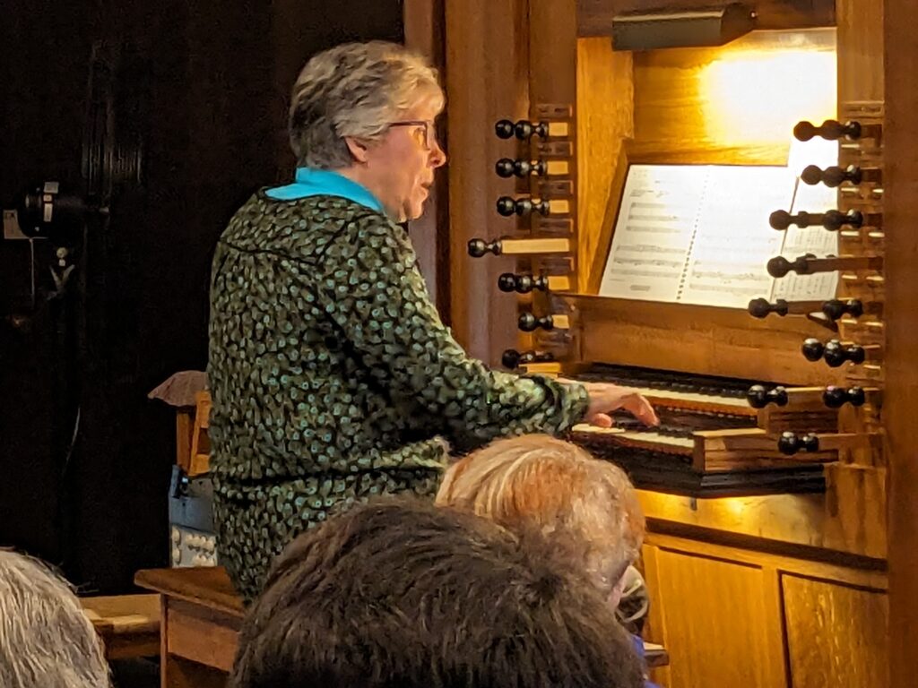 woman playing the organ