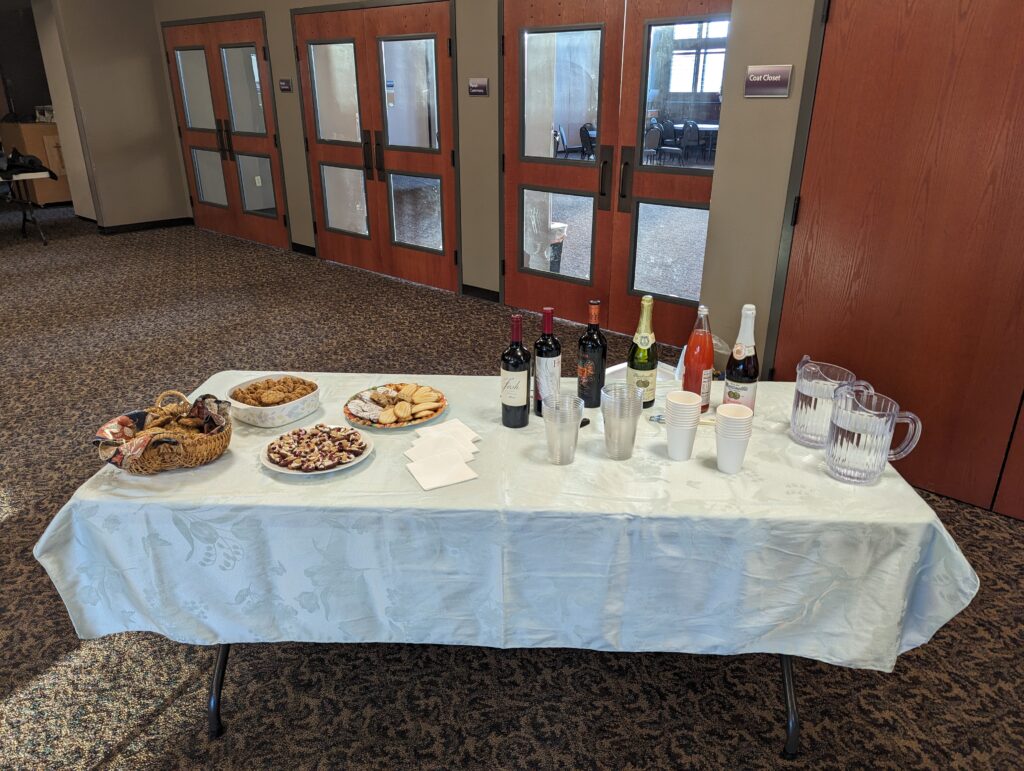 table of beverages and cookies