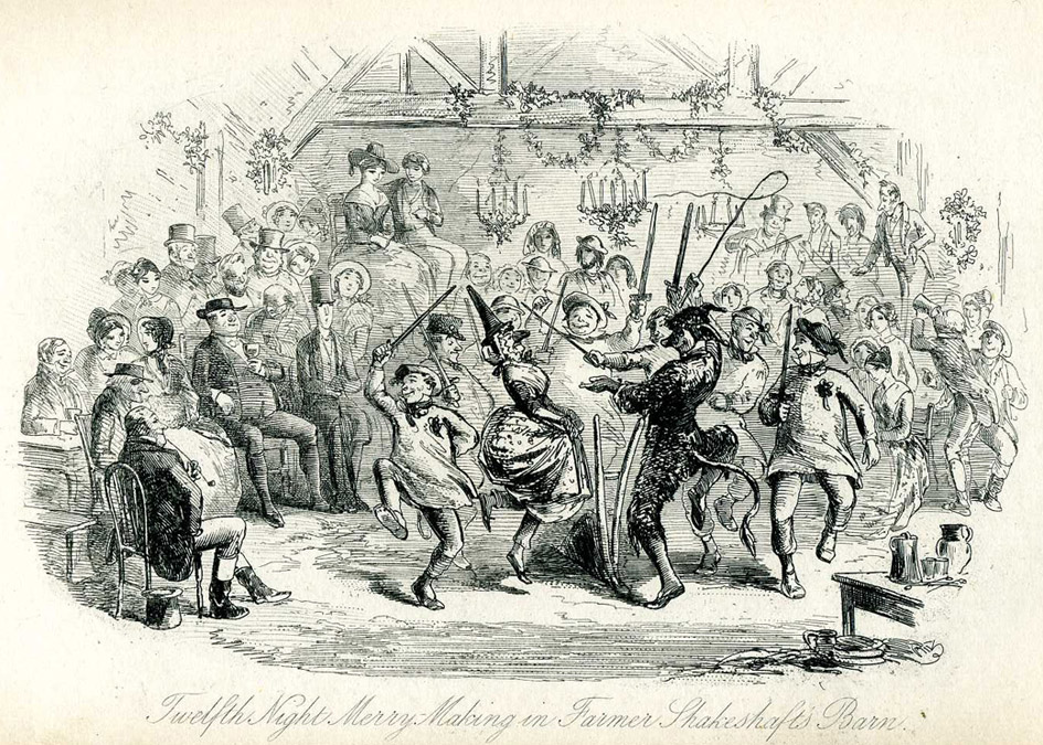 Rousing party in a barn with people dancing in costume