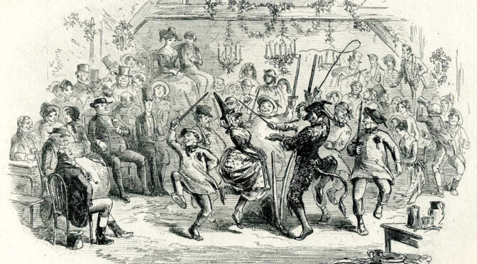 Rousing party in a barn with people dancing in costume